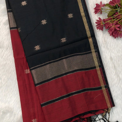 Black and maroon semi maheshwari silk cotton saree (thin, lightweight) zari woven borders and buttas all over, contrast pallu, plain running blouse with borders. NS360