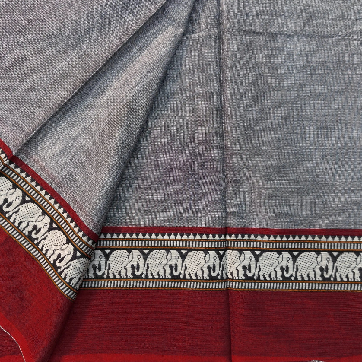Grey mercerised handloom cotton saree with thread woven elephant double side borders(thin, soft)running pallu and running blouse. NS365