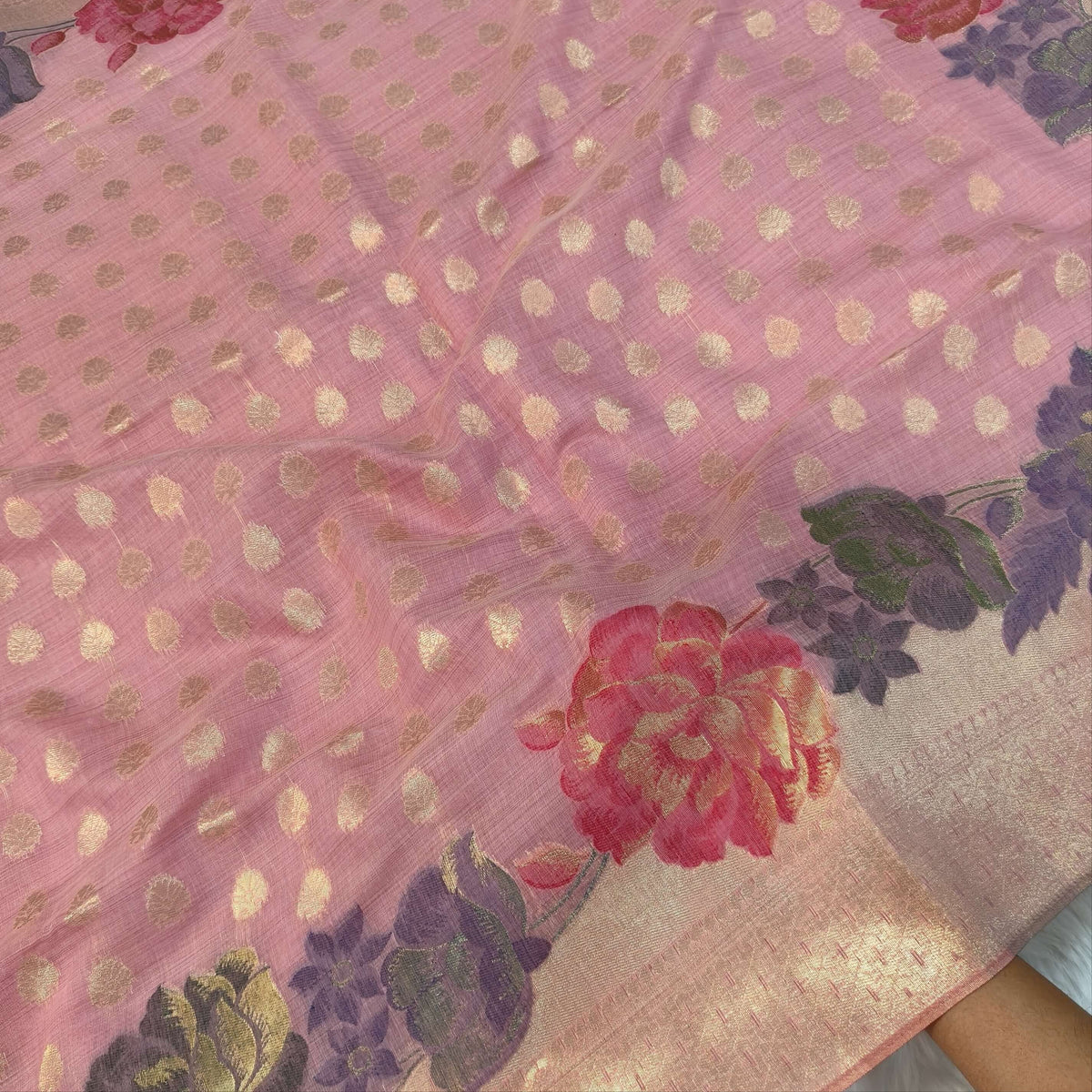 Pastel pink premium jamdani woven silk cotton saree,with zari woven buttas all over,gold zari woven double side borders,jamdani weaving on pallu with tassles, running blouse with zari buttas and borders. NS250