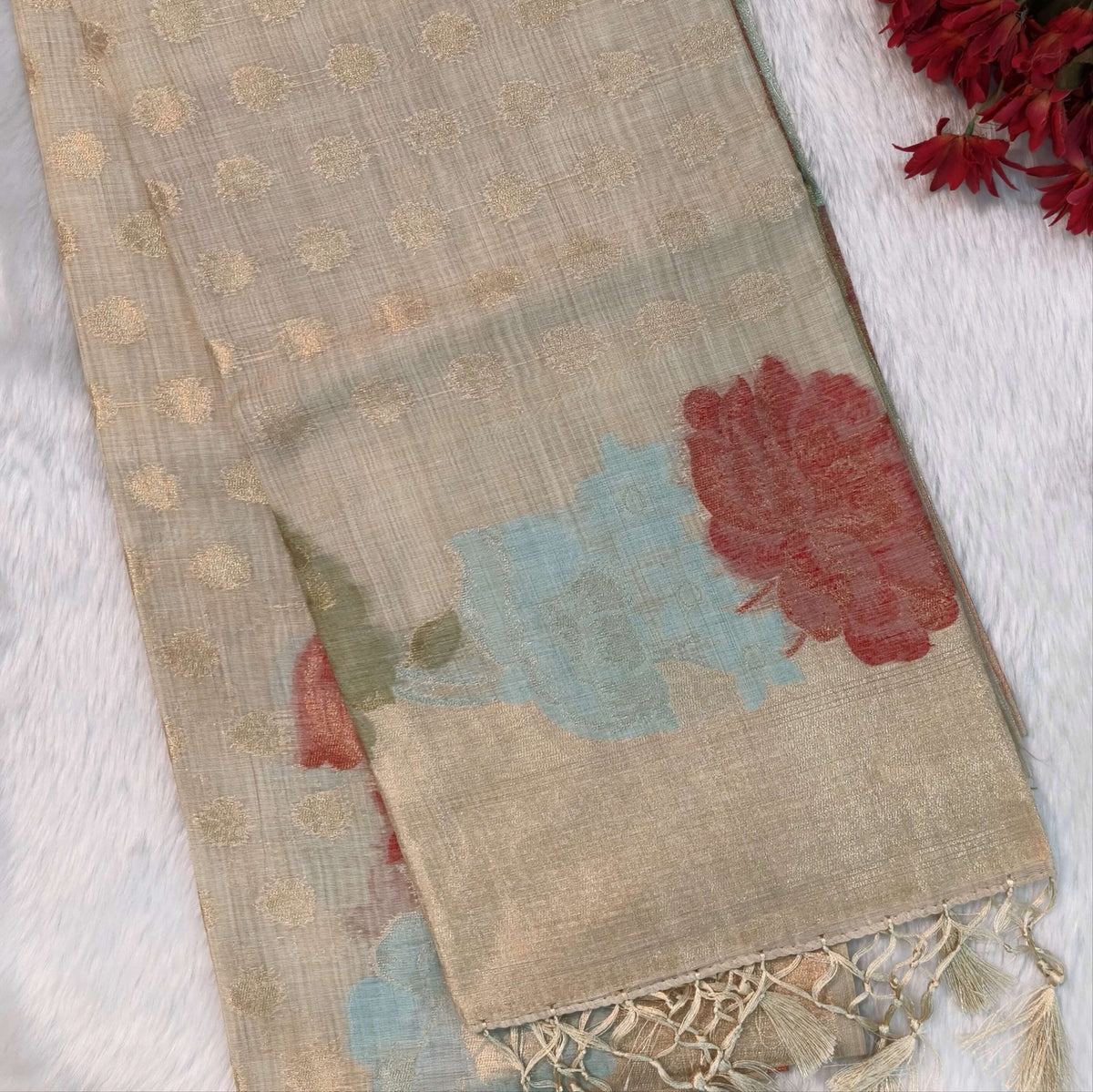 Beige premium jamdani woven silk cotton saree,with zari woven buttas all over,gold zari woven double side borders,jamdani weaving on pallu with tassles, running blouse with zari buttas and borders. NS254