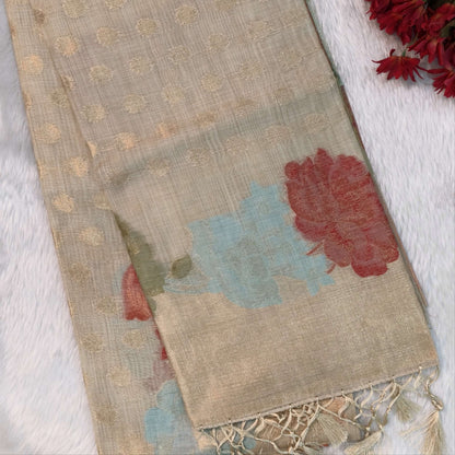 Beige premium jamdani woven silk cotton saree,with zari woven buttas all over,gold zari woven double side borders,jamdani weaving on pallu with tassles, running blouse with zari buttas and borders. NS254
