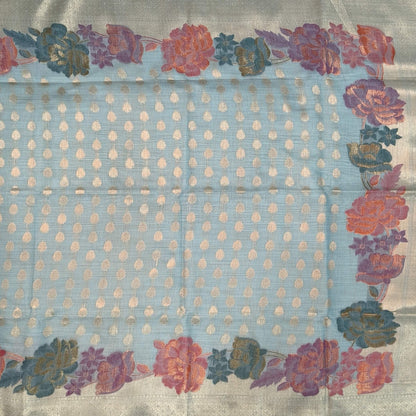 Pastel blue premium jamdani woven silk cotton saree,with zari woven buttas all over,gold zari woven double side borders,jamdani weaving on pallu with tassles, running blouse with zari buttas and borders. NS251