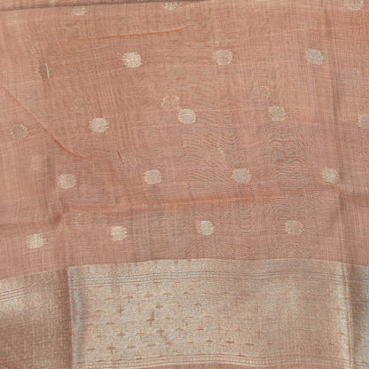 Pastel peach premium jamdani woven silk cotton saree,with zari woven buttas all over,gold zari woven double side borders,jamdani weaving on pallu with tassles, running blouse with zari buttas and borders. NS253