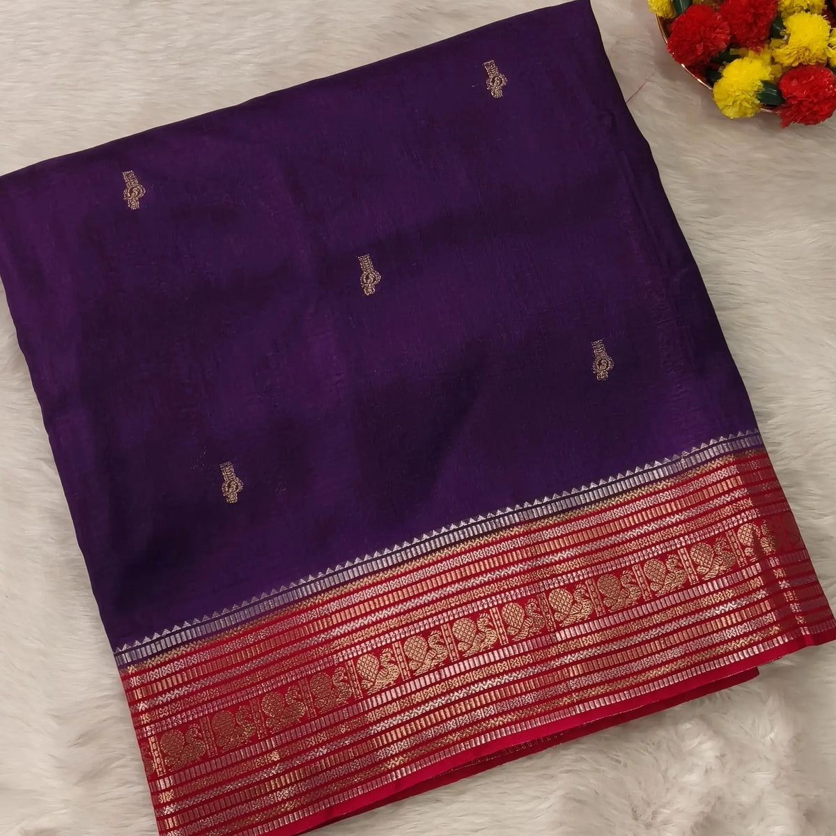 Purple jakard viscous silk saree with zari woven buttas all over, contrast double side gold and silver zari woven border (Silky, Thin)Contrast pallu with striped, crepe silk blouse with zari buttas. NS368