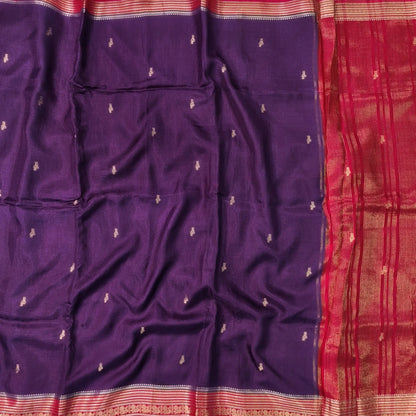 Purple jakard viscous silk saree with zari woven buttas all over, contrast double side gold and silver zari woven border (Silky, Thin)Contrast pallu with striped, crepe silk blouse with zari buttas. NS368