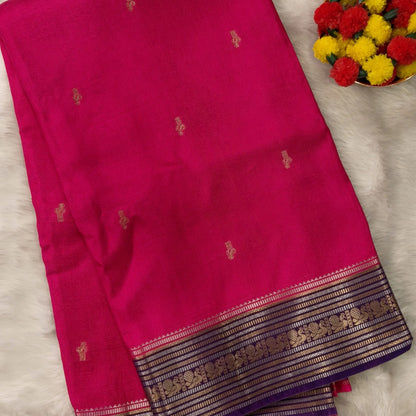 Bright pink jakard viscous silk saree with zari woven buttas all over, contrast double side gold and silver zari woven border (Silky, Thin)Contrast pallu with striped, crepe silk blouse with zari buttas. NS366