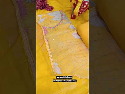Bright yellow floral printed  pure organza unstitched salwar material, thread embroidered on yoke, zari buttas all over(thin, lining needed)matching santoon bottom, fancy chiffon dupatta thread& sequins work. CODE JL253001