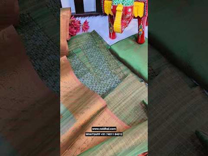 Green with golden tint tissue silk cotton unstitched salwar material, bead& sequins work on yoke(thin, lining needed)matching silk cotton bottom, soft tissue silk cotton dupatta with copper zari woven design( DESIGN MIGHT VARY). CODE JN252407