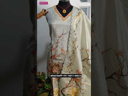 Pale green with golden tint designer digital printed tissue silk unstitched salwar material, v neck, thread work on yoke &front(thin, lining needed)matching santoon bottom, digital printed tissue silk dupatta with heavy hand embroidery. CODE AG251213