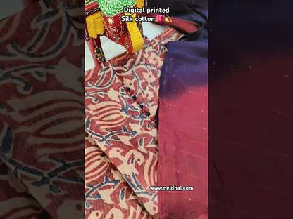 Maroon base digital printed silk cotton unstitched salwar material, potli buttons on yoke(thin fabric, lining needed)dark blue cotton bottom, fancy silk cotton dupatta with sequins work. CODE AP253019