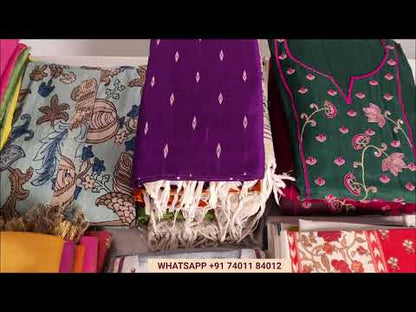 Pastel blue cotton unstitched salwar material,fancy buttons on yoke,printed all over(lining optional)bloc printed teal blue cotton bottom,block printed fancy kota dupatta with tapping. JL262805