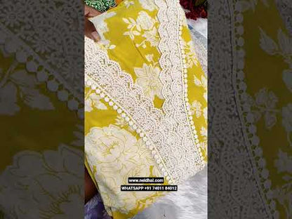 Mehandhi yellow floral printed premium cotton semi stitched salwar material, v neck with lace work(lining needed)matching cotton bottom, block printed pure kota cotton dupatta. CODE JL251214