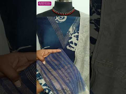 Dark blue floral printed soft silk cotton unstitched salwar material, v neck with zari work(lining needed)light grey silky bottom, dual shaded soft silk cotton short width dupatta with zari& sequins work. CODE AG252203