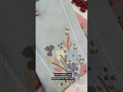 Pastel green kota silk cotton unstitched salwar material, rich bead work on yoke(thin, lining needed)matching santoon bottom, embroidered kota silk cotton dupatta with lace tapings. CODE JL251501