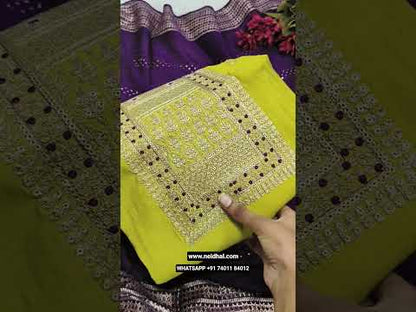 Light mehandhi green silk cotton unstitched salwar material, rich zari& sequins work on yoke(lining needed)purple spun cotton bottom, jakard silk cotton dupatta with zari borders. CODE JL251001