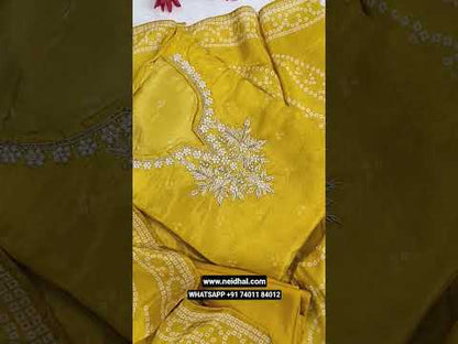 Designer golden mehandhi yellow bandhini printed pure organza silk unstitched salwar material, rich zardozi& bead work on yoke(thin, lining needed)matching santoon bottom, bandhini printed pure organza silk short width dupatta. CODE JL251810