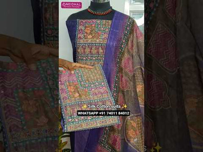 Purple silk cotton unstitched salwar material, digital printed yoke with zari &sequins work, zari buttas all over(thin, lining needed)matching spun cotton bottom, multi color digital printed silk cotton dupatta. CODE AG252001