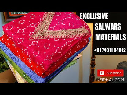 Green& orange block printed premium super net unstitched salwar material, panel pattern on front(netted fabric, lining needed)mehandhi yellow silk cotton bottom, block printed premium super net full length dupatta. CODE JA251909