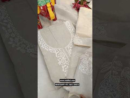 Golden beige designer tissue silk cotton unstitched salwar material, embroidered on &sequins work yoke& front(thin, lining needed)matching spun cotton bottom, embroidered premium tissue silk cotton dupatta with tissue borders& tassels. CODE JL252807