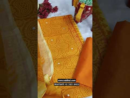 Bright mango yellow& pastel yellow block printed semi georgette unstitched salwar material, panel pattern on front(thin fabric, lining needed)matching silk cotton bottom, block printed dual shaded fancy chiffon dupatta. CODE JL252007