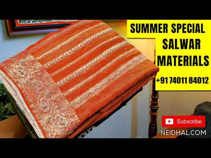 Black semi tussar unstitched salwar material (shiny, lining needed) digital colorful zigzag print on yoke, matching silky bottom, Digital printed semi tussar full length dupatta with tassels. AG260816