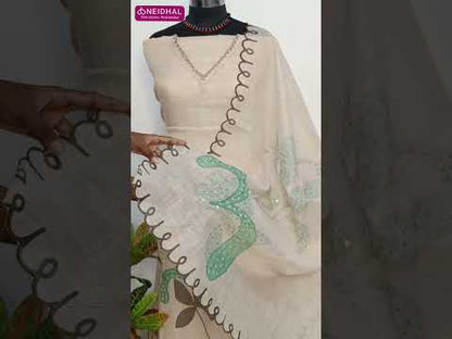 Light beige digital printed tissue linen unstitched salwar material, v neck, bead& sequins work on front(thin, lining needed)matching santoon bottom, digital printed tissue linen dupatta with hand embroidery &scallop edges. CODE AG252811