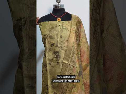 Olive green with golden tint digital printed kota silk cotton unstitched salwar material, fancy buttons on yoke(lining needed)matching silk cotton bottom, digital printed crinkled tissue silk cotton dupatta with banarasi zari borders. CODE AG250108