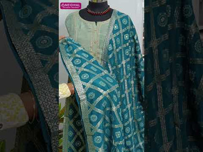 Pastel blue with golden tint designers tissue silk unstitched salwar material, rich zari &sequins work on panel pattern(thin, lining needed)matching santoon bottom, banarasi georgette dupatta with borders. CODE AG252101