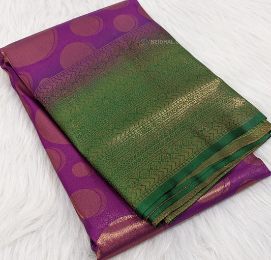 CODE WS118 : Purple copper zari woven soft brocade saree with contrast bottle green zari woven double side borders,rich copper zari woven antique pallu and copper zari woven running blouse