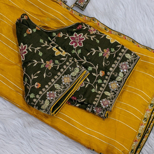 CODE WS880 : Dark fenugreek yellow organza silk saree, pallu with fancy tassels, dark olive green readymade blouse(( height : 15 inches , width : 20 inches , fits upto size 40 , L Size ,can be altered to smaller sizes)DRY CLEAN RECOMMENED