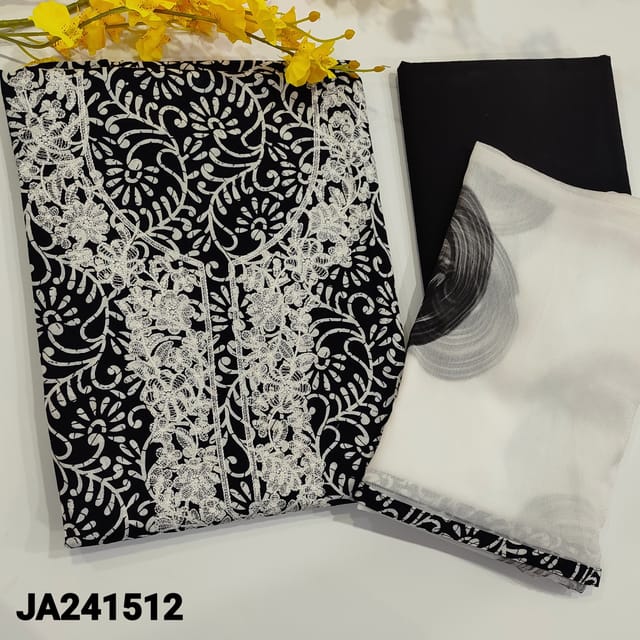 CODE JA241512 : Black and white pure cotton unstitched salwar material,printed all over,yoke with embroidery(lining optional)black cotton bottom,chiffondupatta with brushpaint work and printed tapings.