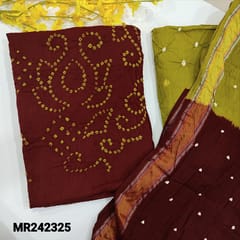 CODE MR242325 : Maroon pure cotton unstitched salwar material,original bandhini work all over(thin,lining needed)contrast Mehandi green cotton bottom,dual shaded cotton dupatta with borders(TAPINGS REQUIRED).