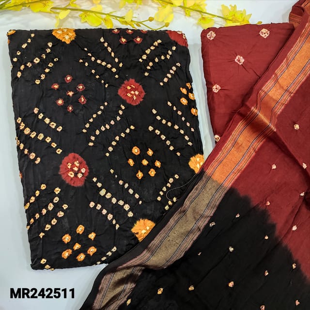 CODE MR242511 : Black base pure cotton unstitched salwar material,original bandhini work all over(thin,lining needed)contrast reddish maroon cotton bottom,dual shaded mul cotton dupatta with borders(TAPINGS REQUIRED).
