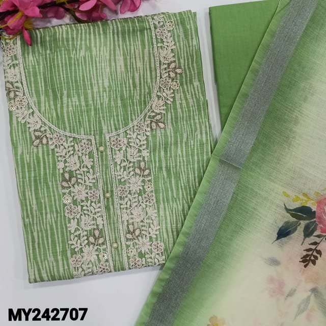 CODE MY242707 : Green semi linen unstitched salwar material, thread, zari& bead work on yoke, abstract printed all over(thin fabric, lining needed)matching cotton bottom, floral printed semi linen dupatta with silver tissue borders.