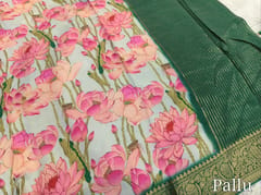 CODE WS1325 :Designer Pastel Green Pure Dola silk saree,double side kanchi borders,beautiful lotus prints all over,zari lines for pallu,sott silkcotton blouse with  zari buttas