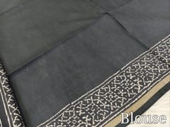 CODE WS1359 : Light grey with black art linen saree, printed all over, block printed pallu contrast running blouse with borders.