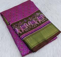 CODE WS558 :Bright pink fancy semi-silk (soft and silky),beautiful zari woven borders, patola prints all over, printed pallu and running printed blouse with borders.