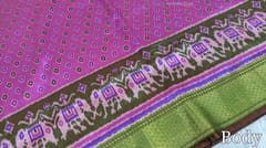 CODE WS558 :Bright pink fancy semi-silk (soft and silky),beautiful zari woven borders, patola prints all over, printed pallu and running printed blouse with borders.