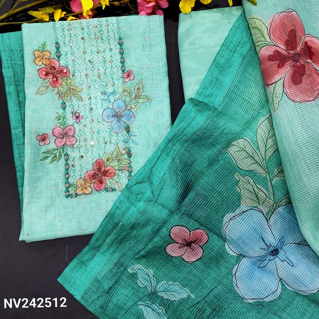 CODE NV242512 : Light& dark shaded turquoise blue premium silk cotton unstitched salwar material, printed yoke with real mirror& sequins work, zari buttas all over(lining needed)matching silky bottom, floral printed silk cotton dupatta.