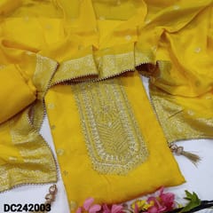 CODE DC242003 : Light sun shine yellow jakard dola silk unstitched salwar material, zari work on yoke& front, self design all over(silky fabric, lining needed)matching santoon bottom, dola silk dupatta with zari woven buttas& borders.