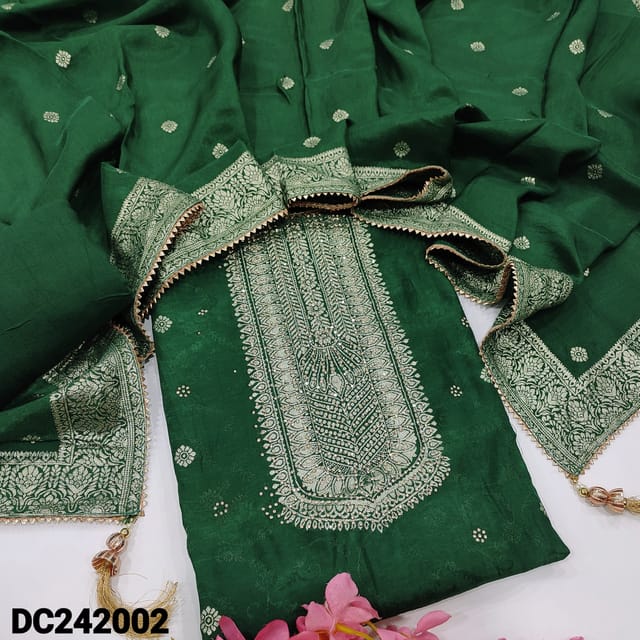 CODE DC242002 : Bottle green jakard dola silk unstitched salwar material, zari work on yoke& front, self design all over(silky fabric, lining needed)matching santoon bottom, dola silk dupatta with zari woven buttas& borders.